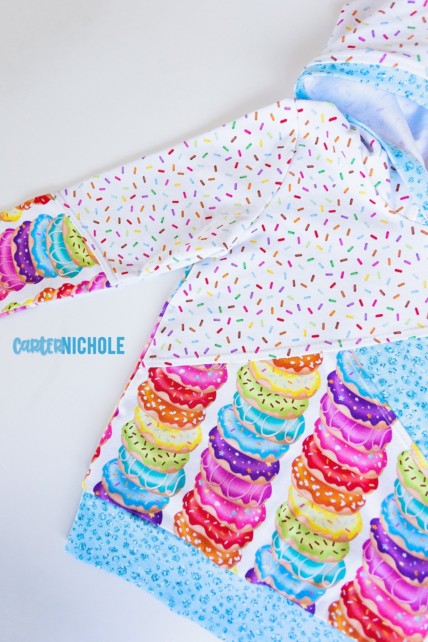 R119 Sweet Beginnings - Rainbow Stacked Donuts